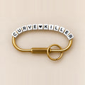 Freedom Curve Killer Gold Bag Charm